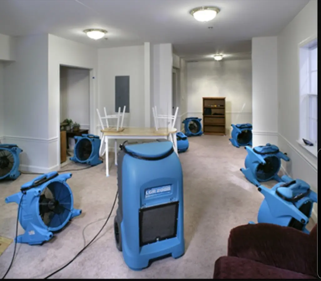 Air movers and dehumidifier setup for Water Damage Restoration in Conroe